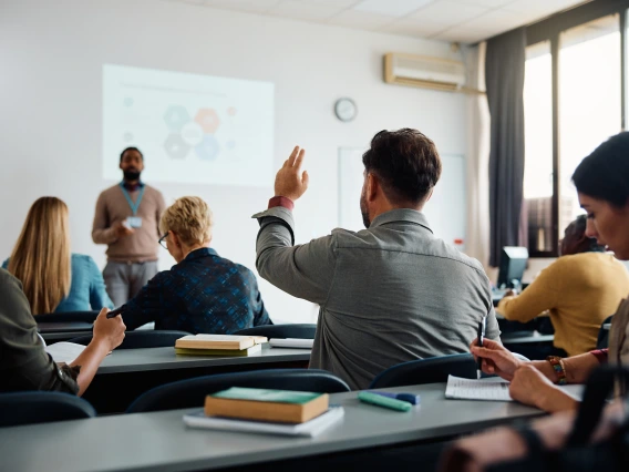 Students interacting with Professor