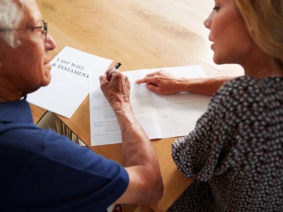 two people writing a will