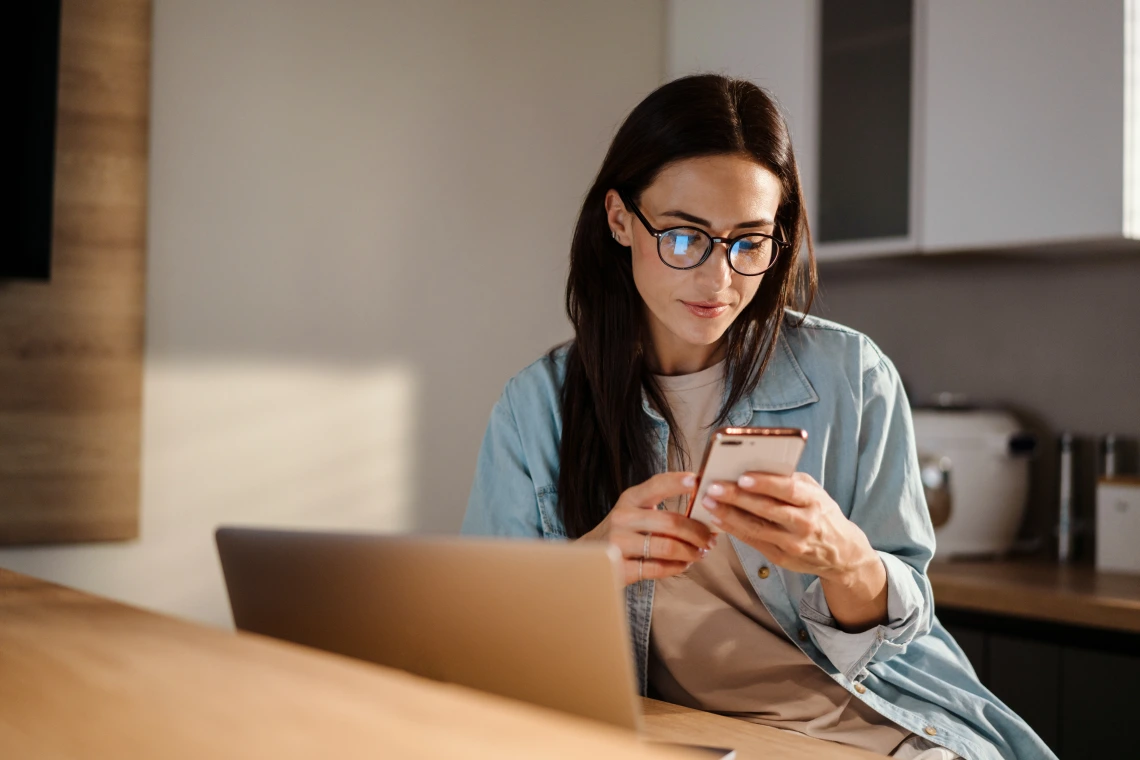 Woman using smartphone.