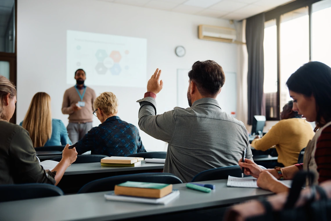 Students interacting with Professor