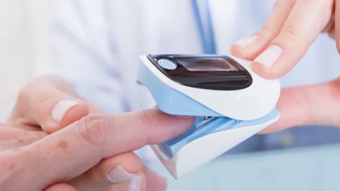 Close up shot of medical device on patient's finger