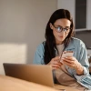 Woman using smartphone.
