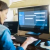 Women in front of a computer using an AI chatbot